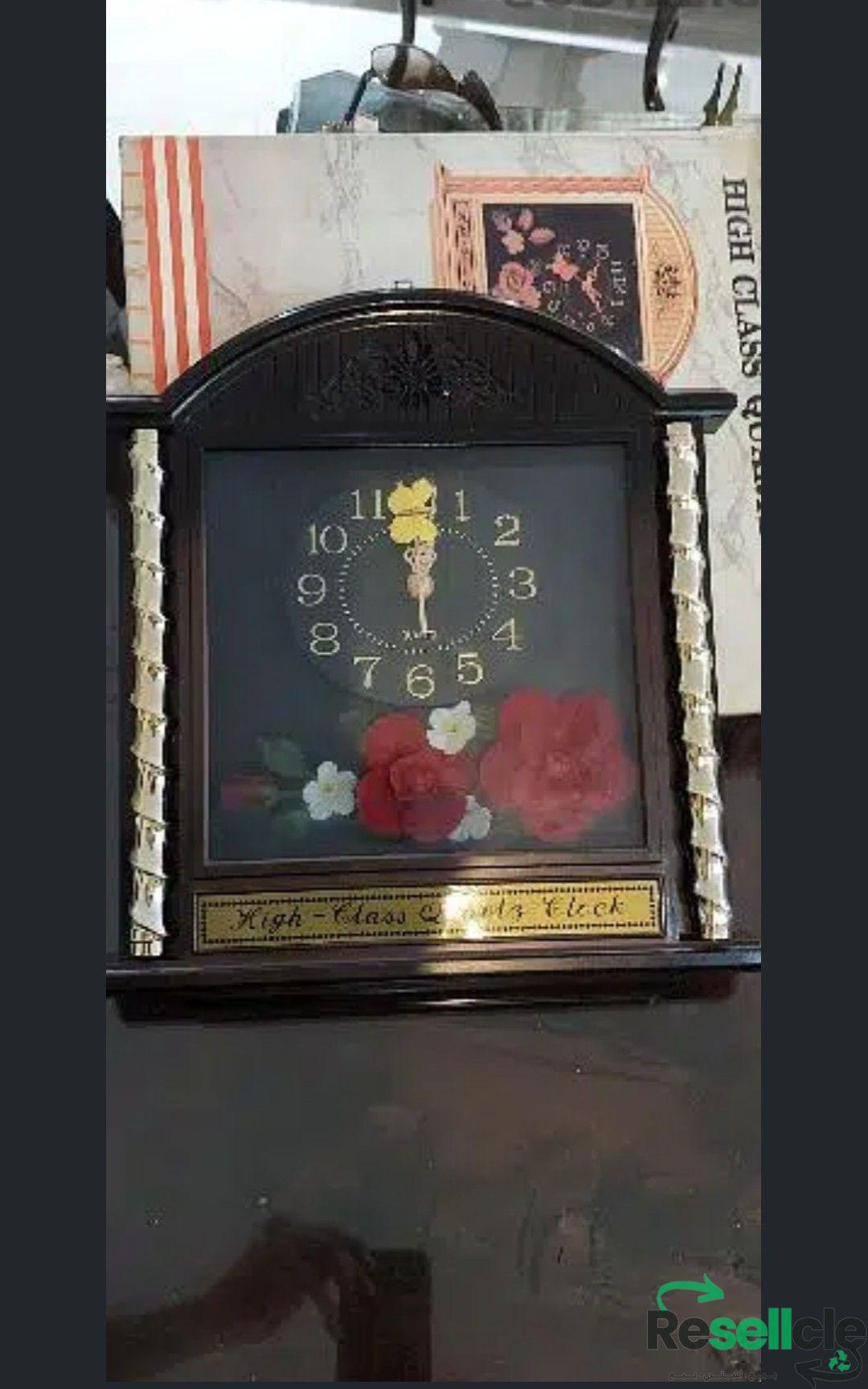 ساعه حائط مع موسيقى